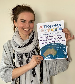 Kate writes on poster how 26TEN changed her world
